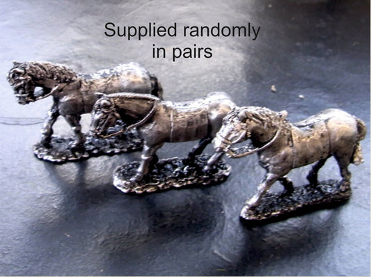 A Pair of Ancient or Dark Age Horses with Saddlecloth